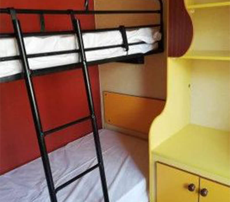 Etagenbettzimmer im 25m²-Komfort-Mobilheim auf dem Campingplatz Camping Le Neptune in Agde