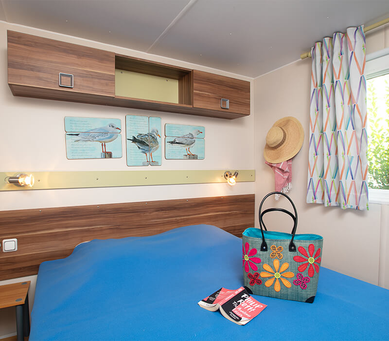 Tweepersoonskamer stacaravan model premium luxe 33m² - Camping Agde Le Neptune