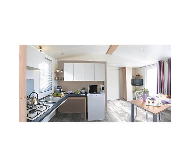 Coin cuisine et repas mobil-home gamme premium PMR 33m² - Camping Le Neptune Agde